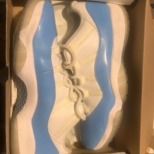 White and university blue retro low top Jordan 11s